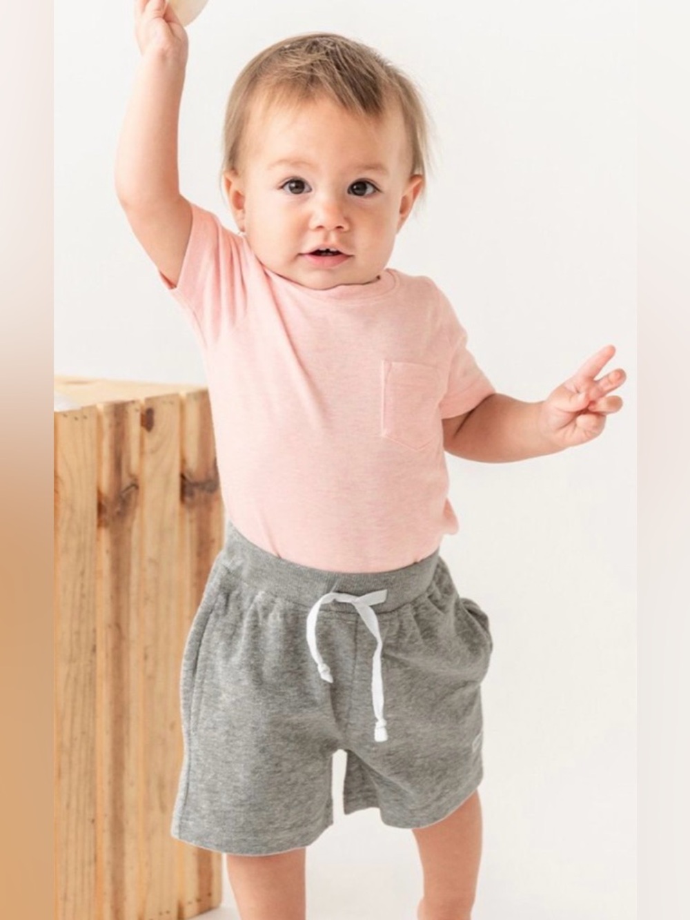 NWT - RuggedButts Pale Pink Short sleeve pocket bodysuit